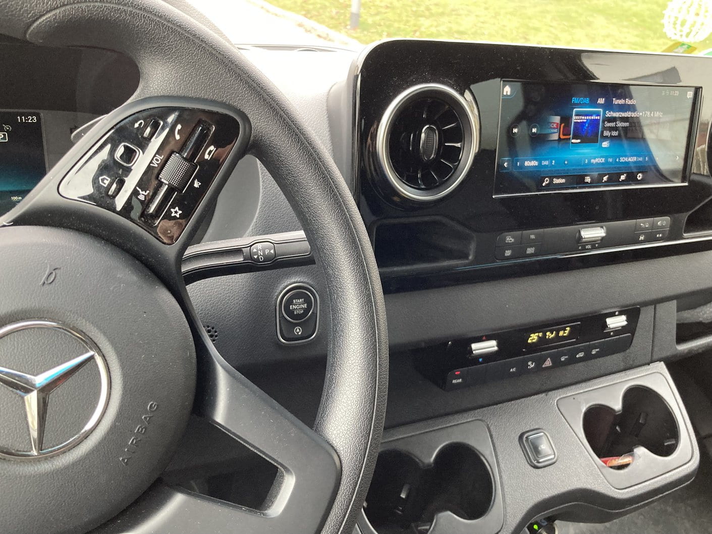 Sprinter van dashboard with touchscreen radio, steering wheel controls and push-button start