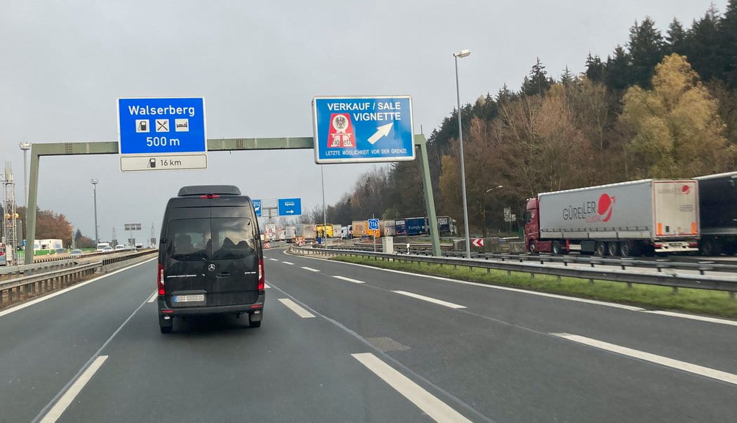Mercedes-Benz Sprinter 9 passenger van on the Autobahn approaching the Austrian border at Walserberg
