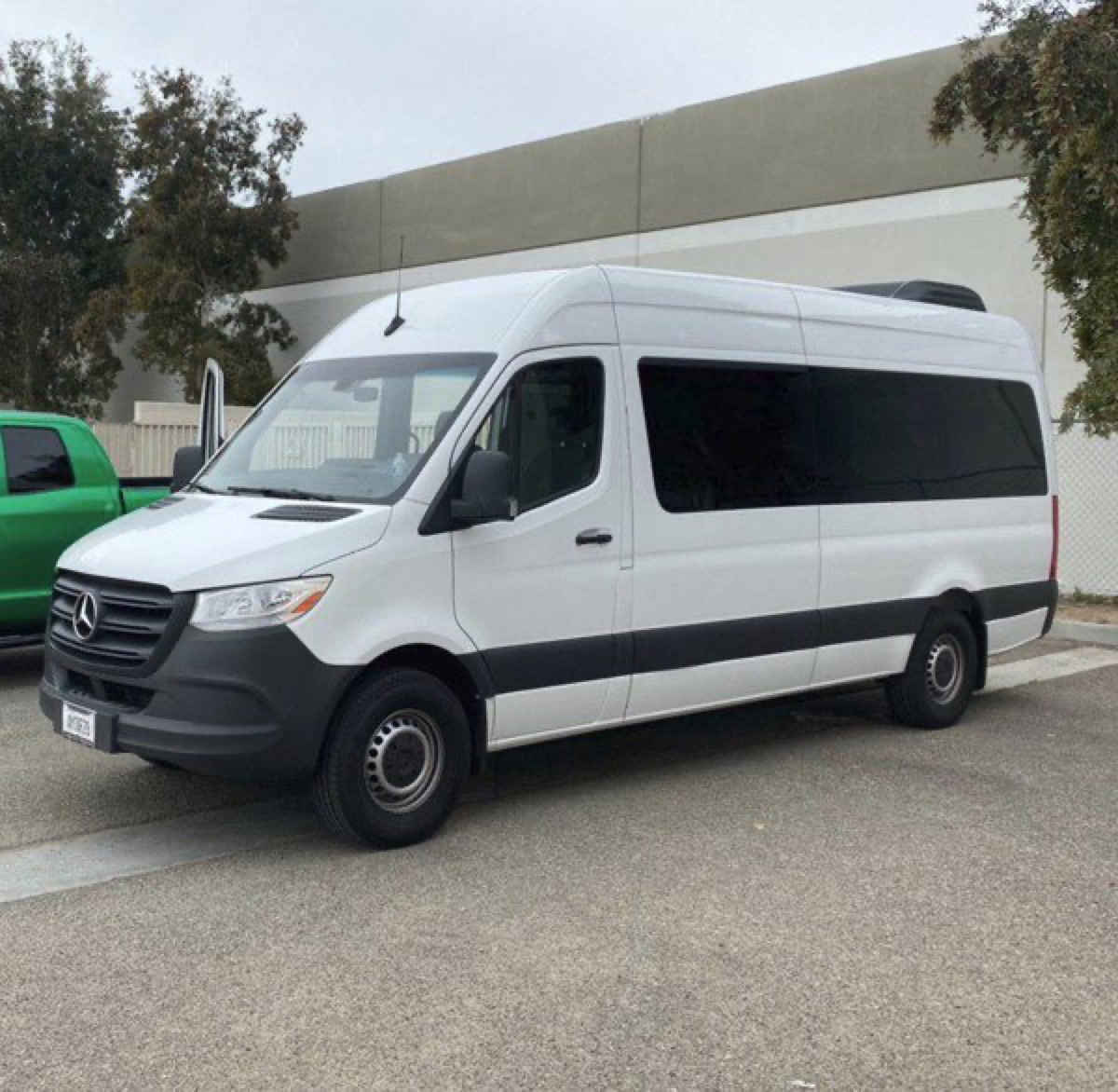 White Mercedes-Benz 15-passenger Sprinter high roof van for rent on the Big Island near Kailua-Kona