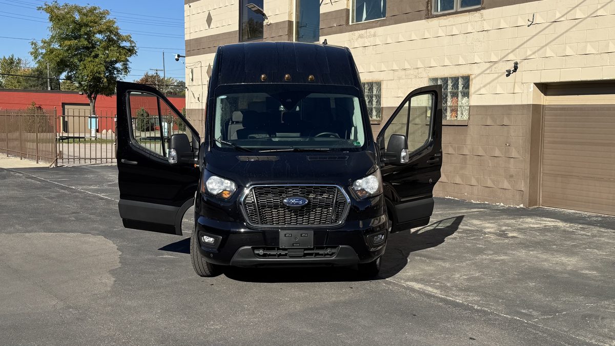Black Ford Transit 15-passenger high roof van for rent in Detroit Michigan near DTW airport