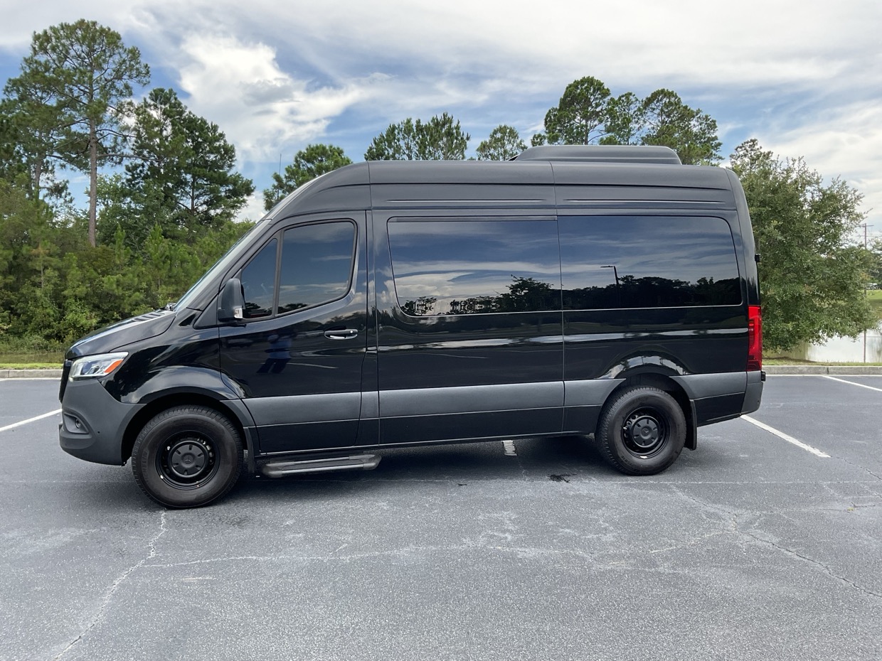 Black Mercedes-Benz Sprinter passenger van for rent in Eugene, Oregon near EUG Airport — Sprinter Rentals Eugene location