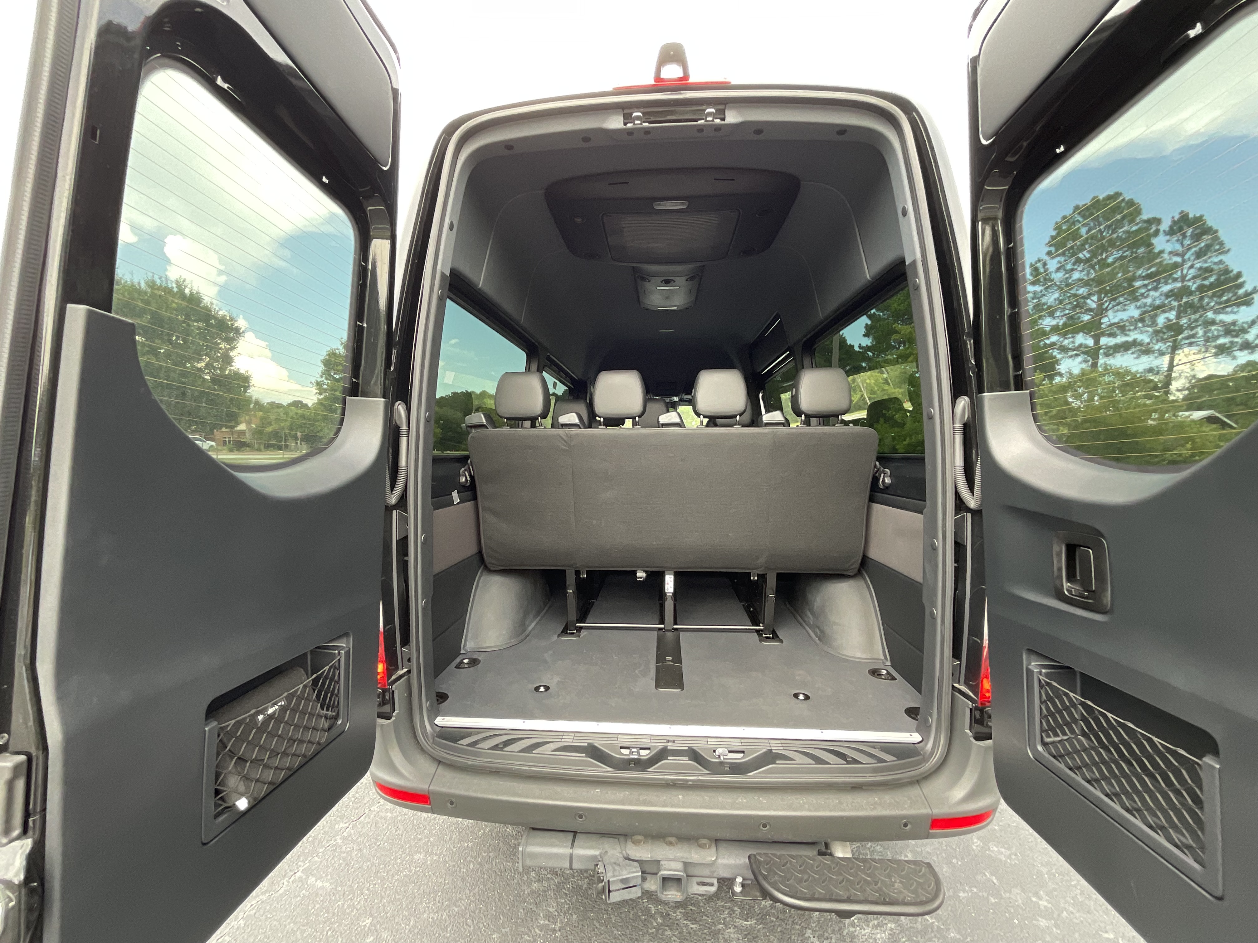Black Mercedes-Benz Sprinter 12-passenger van interior for rent in Eugene, OR