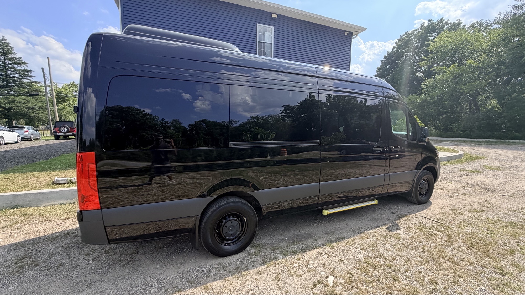 Black 2025 Mercedes-Benz 15-seater Sprinter van with trunk for rent in Eugene, OR
