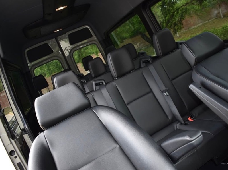 Driver and passenger seats inside a Sprinter van in Greensboro