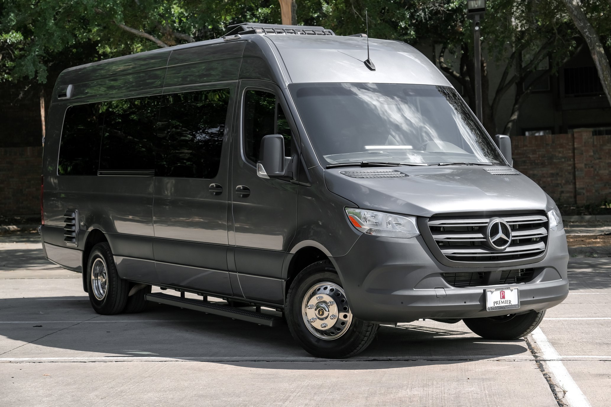 VIP Sprinter luxury 12-seater Mercedes-Benz passenger van with cargo space for rent in Houston
