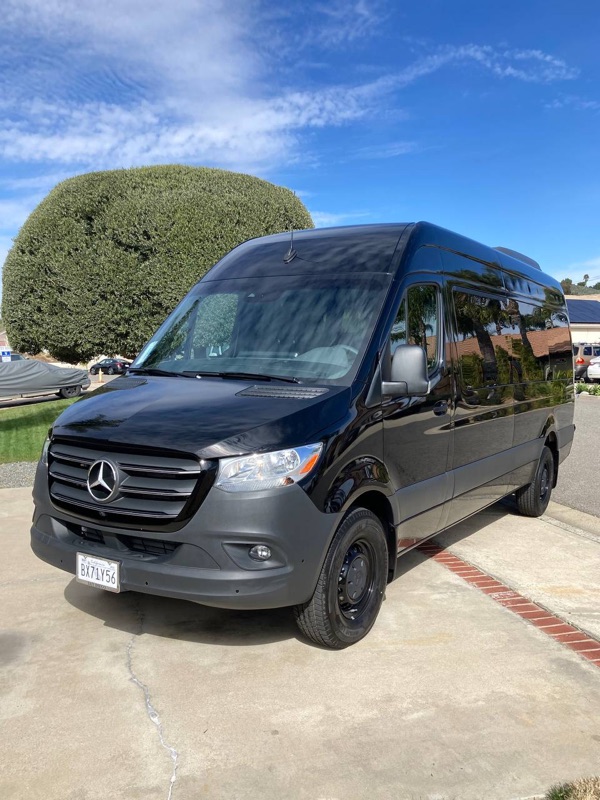 White Mercedes Sprinter van exterior parked in Los Angeles