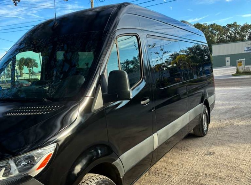 15-seater black Sprinter van for rent in Miami, Florida