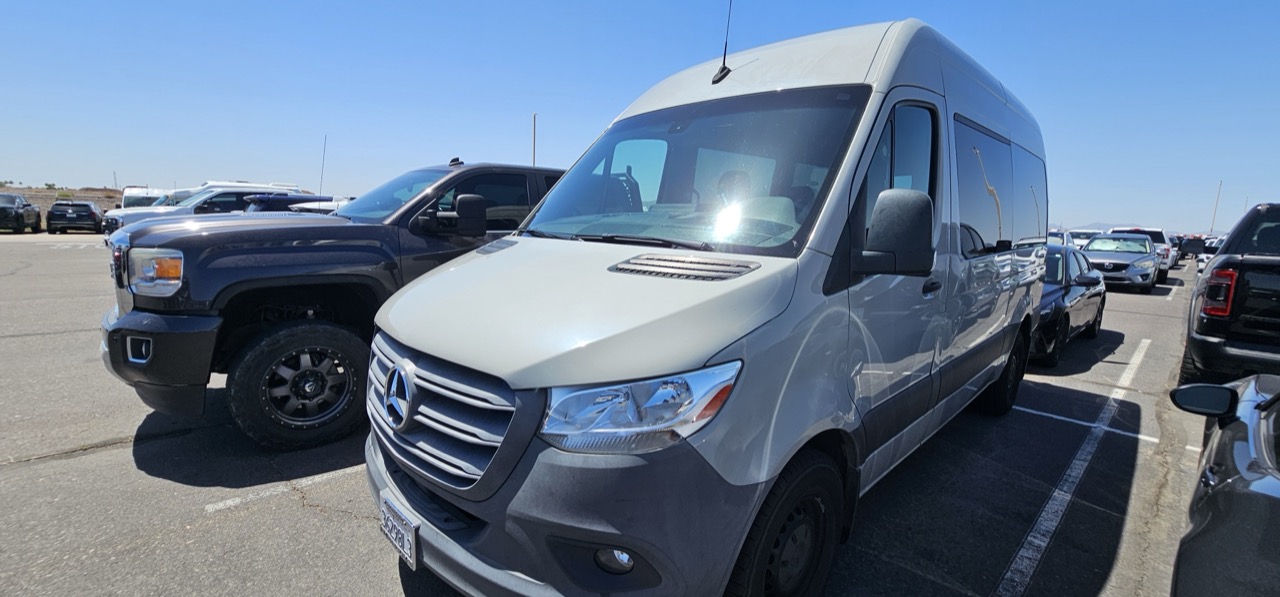 Silver Mercedes-Benz Sprinter passenger van available for rent in Norfolk, VA near ORF airport