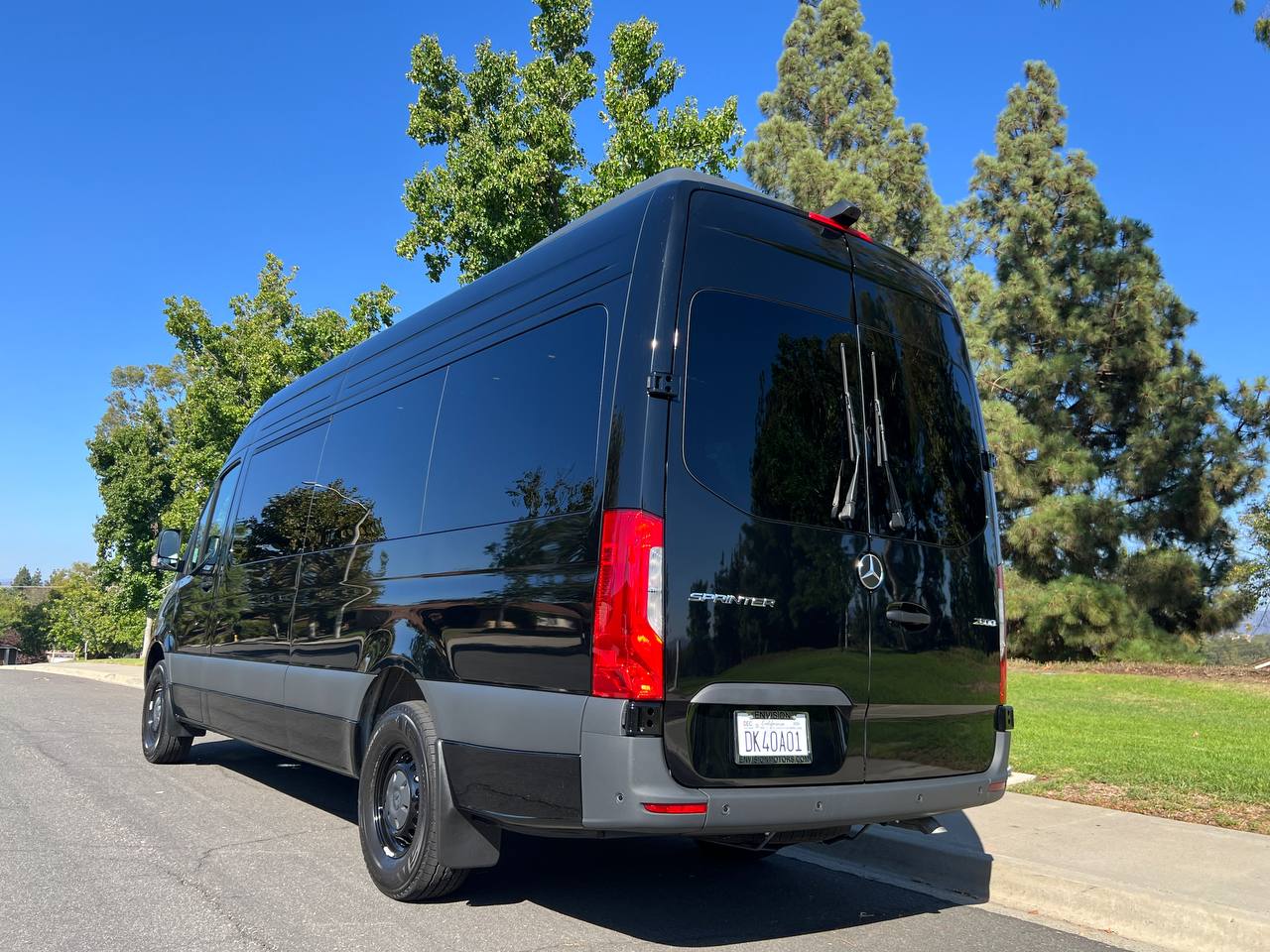 Black Mercedes-Benz 15-seater Sprinter passenger van for rent in Orange County, California