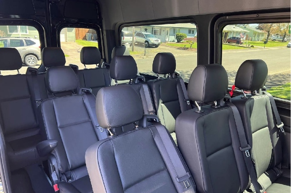 Short Mercedes-Benz Sprinter 144WB 12-passenger van in black — Orange County van rental fleet