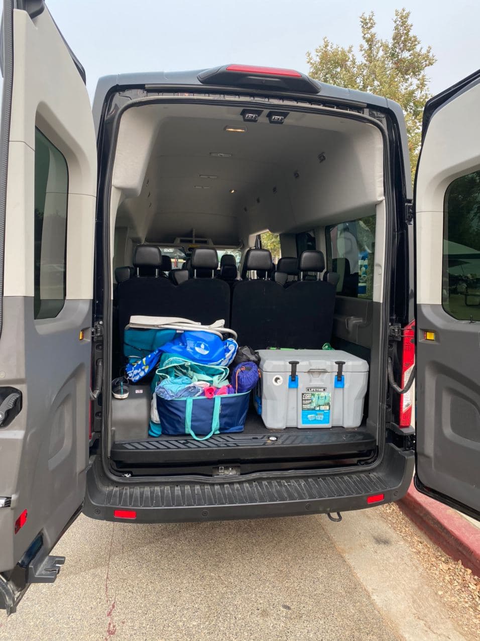 15-passenger Ford Transit van interior with recliner seats — Phoenix van rental