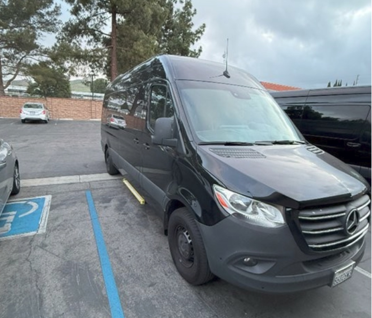 15-passenger black Mercedes-Benz Sprinter van for rent in Ontario, CA