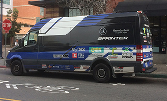 Custom wrapped Sprinter van rental in San Diego