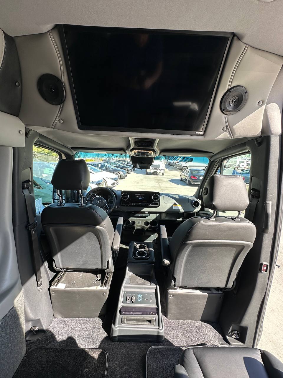 VIP Mercedes-Benz Sprinter 11-seater luxury van with large TV for rent in San Francisco