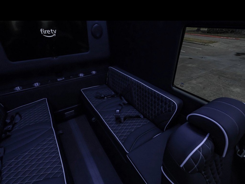 Mercedes-Benz Sprinter passenger van available for rent in Texarkana, TX — side profile