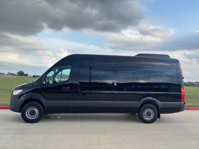 Full left-side view of Mercedes-Benz Sprinter passenger van rental serving Wichita Falls, TX and SPS airport