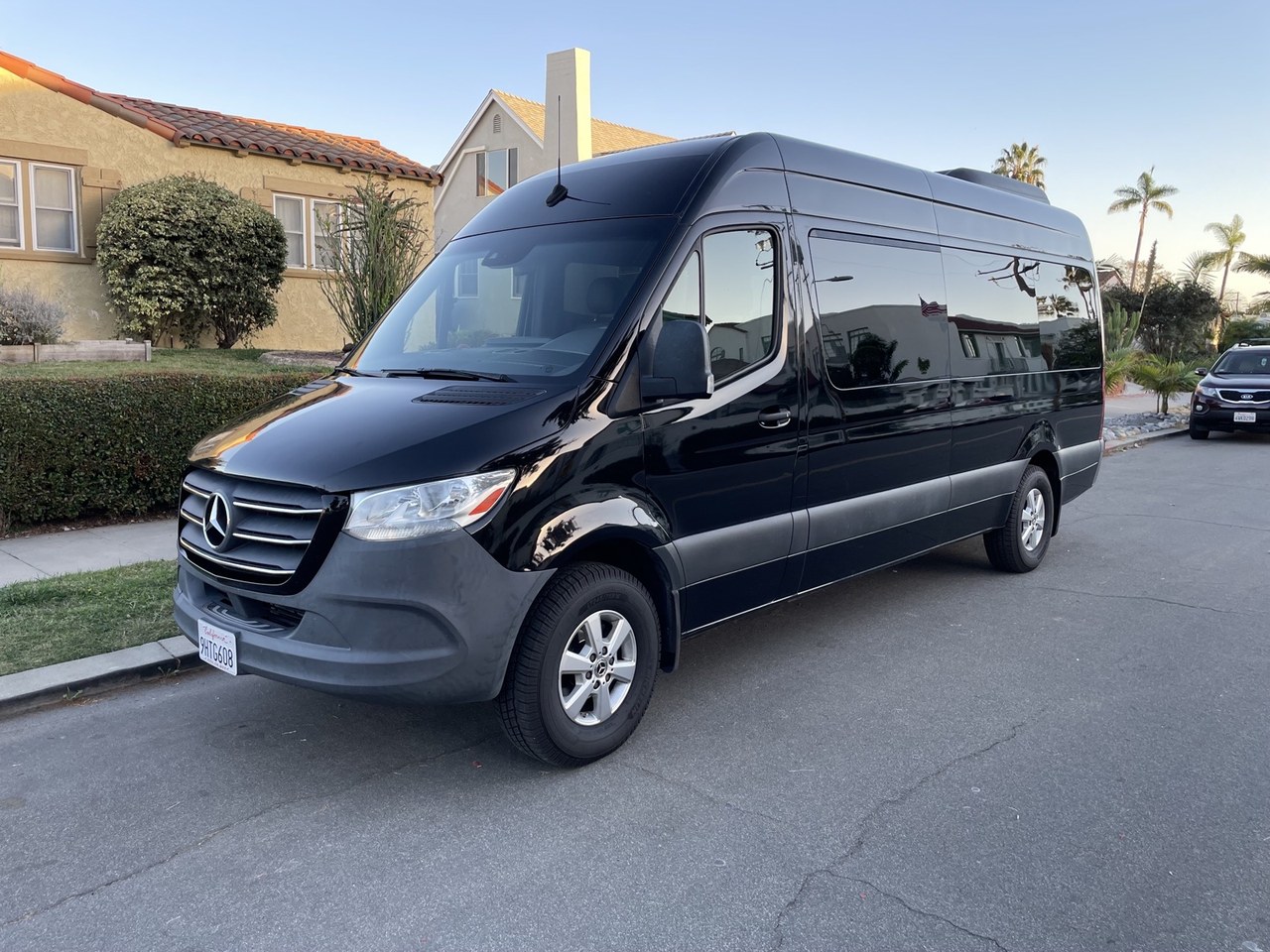 Mercedes-Benz Sprinter passenger van side view for Wichita Falls group travel near Sheppard AFB