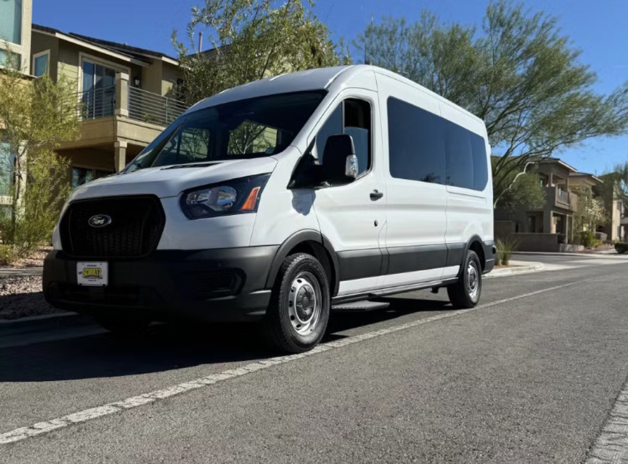 Front-side view of Mercedes-Benz Sprinter passenger van rental in Wilmington, NC