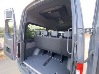 Side door open showing seats and cargo space