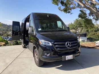 Sprinter van front three-quarter view with the side door open