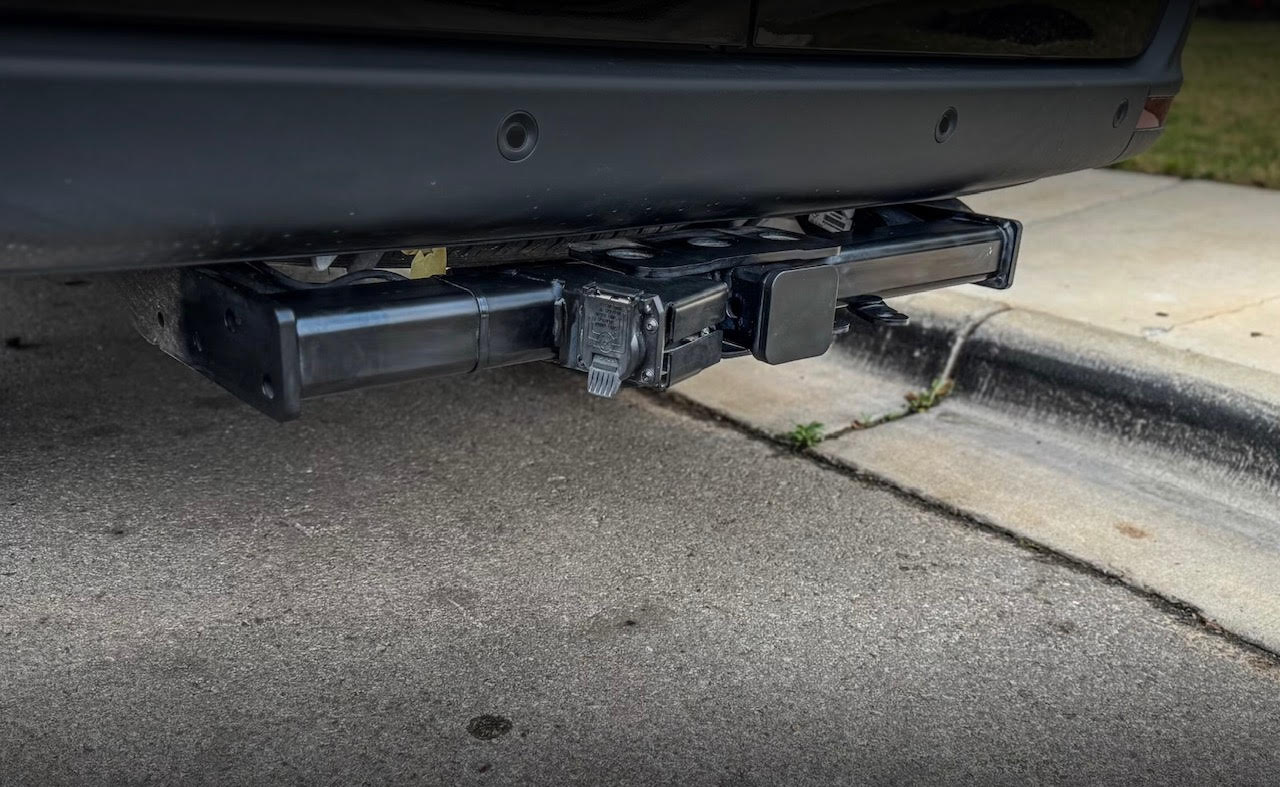Trailer hitch mounted on the rear of the van