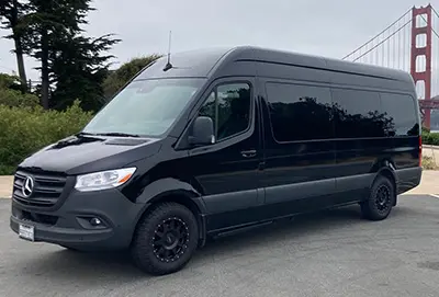 A rented 9-passenger Mercedes-Benz Sprinter business van for professional travel