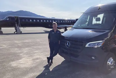 A rented executive Mercedes-Benz Sprinter van available for premium travel